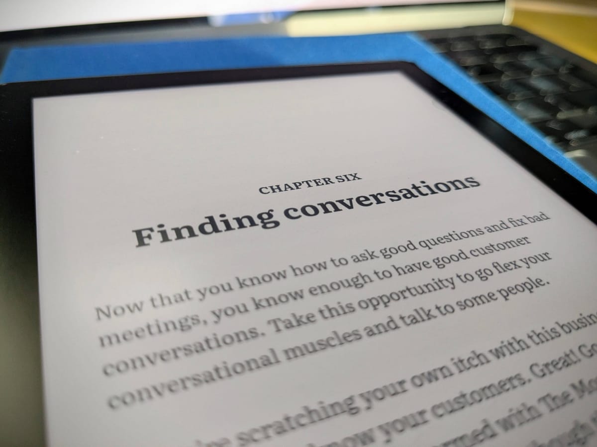 An e-reader showing chapter six of a marketing self-help book with the title 'Finding Conversations'.